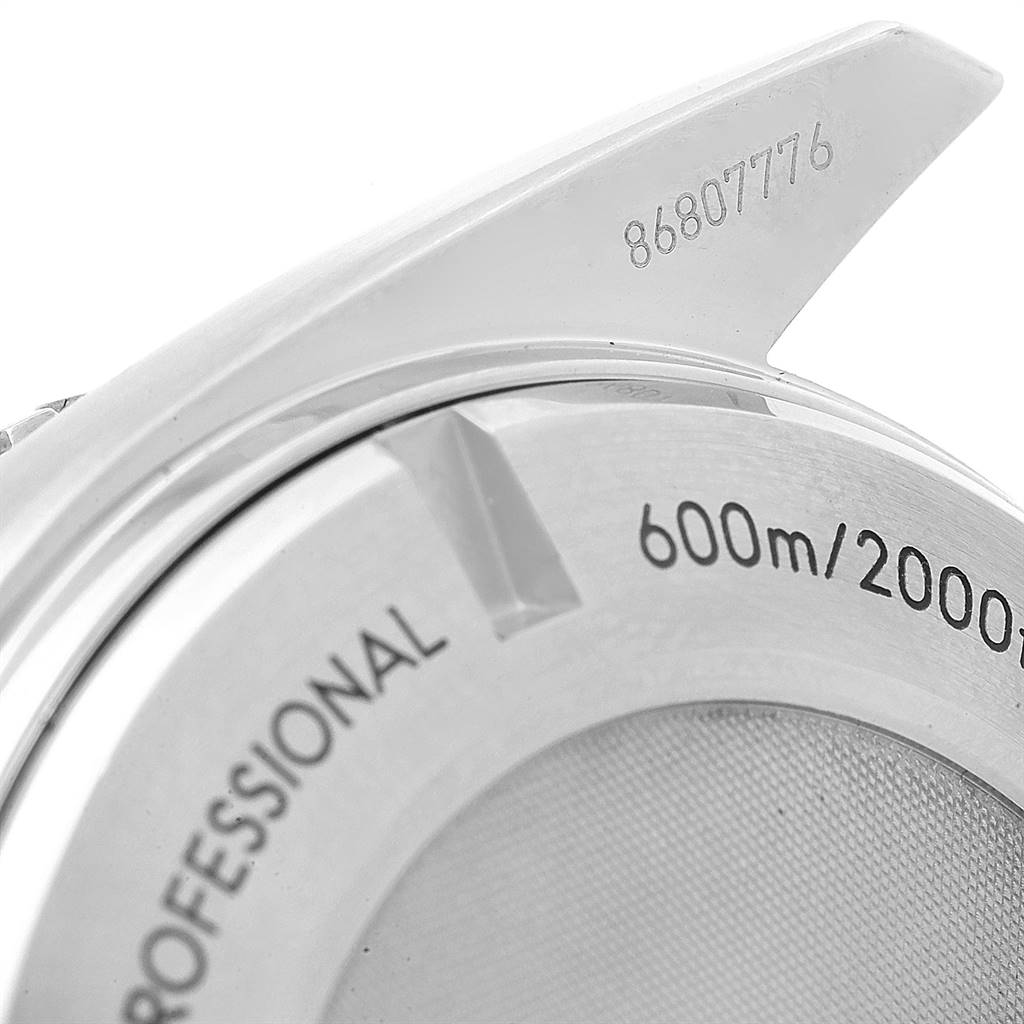 The image shows a close-up of the Omega Planet Ocean 522.30.46.21.01.001 Men
s Stainless Steel Black Dial 522.30.46.21.01.001 Men
s Stainless Steel Black Dial watch
s back, detailing "Professional" and "600m/2000ft" markings.