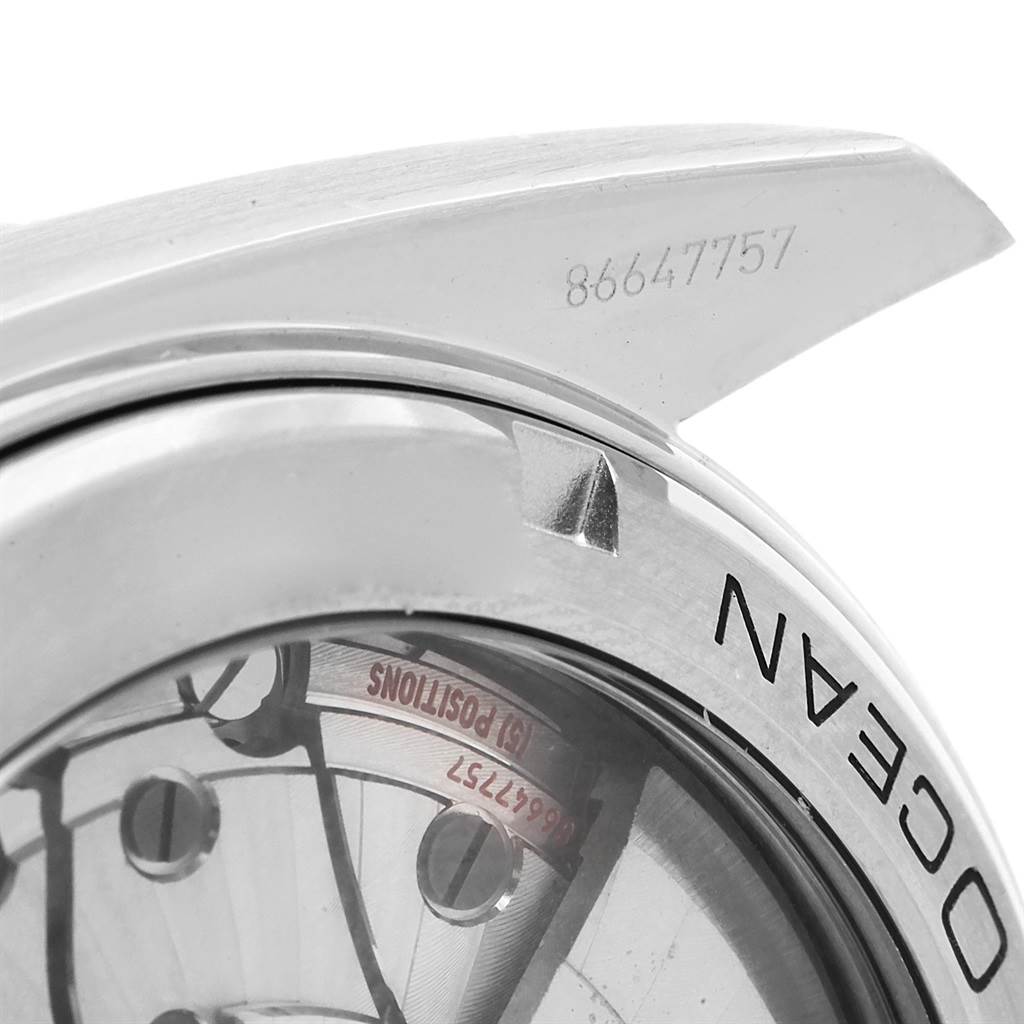 This image shows a close-up of the case back and lugs of the Omega Planet Ocean 232.30.44.22.01.001 Men's Stainless Steel Black Dial 232.30.44.22.01.001 Men's Stainless Steel Black Dial watch.