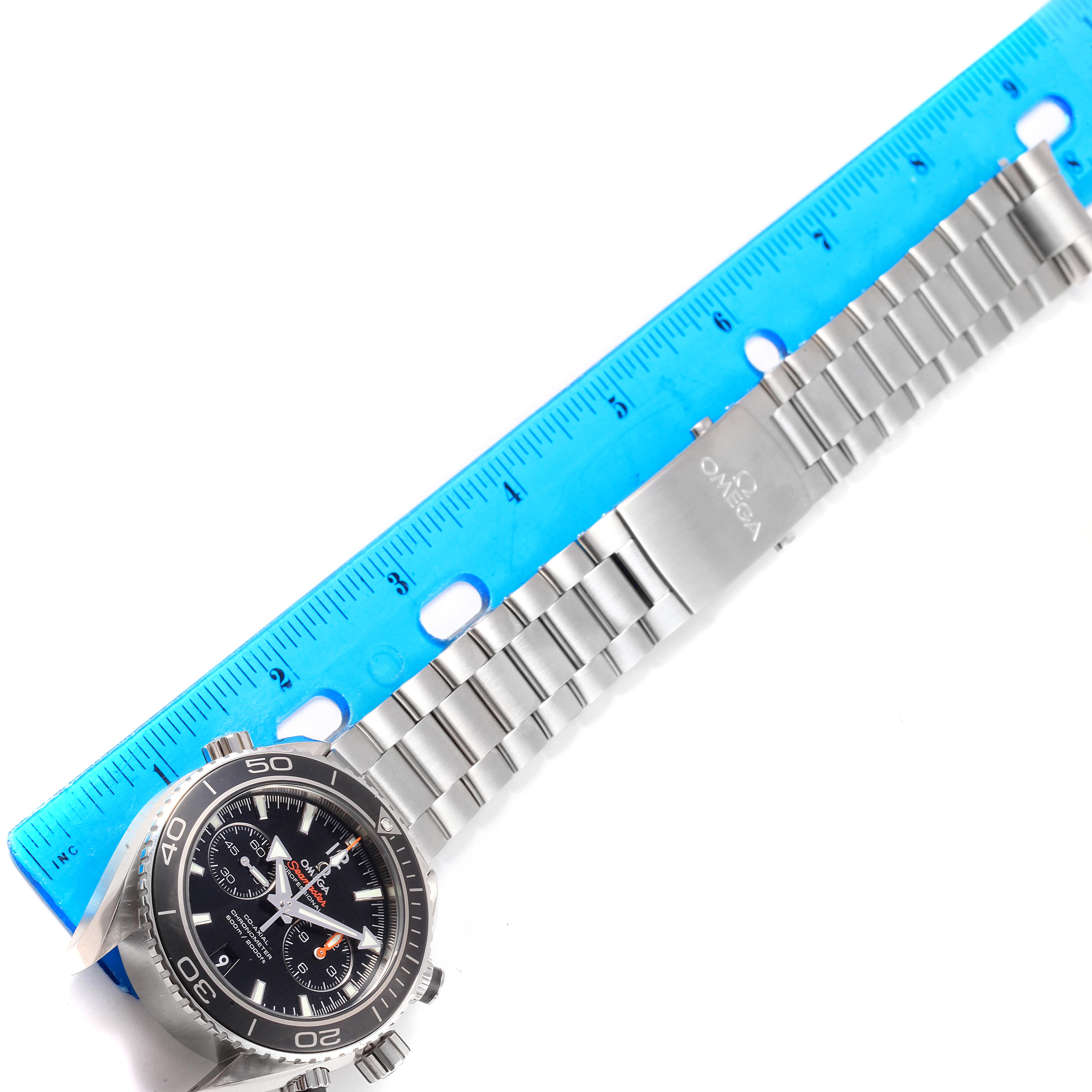 The Omega Planet Ocean 232.30.46.51.01.001 Men
s Stainless Steel Black Dial 232.30.46.51.01.001 Men
s Stainless Steel Black Dial watch is shown from an overhead angle, displaying its dial, bezel, and metal bracelet.