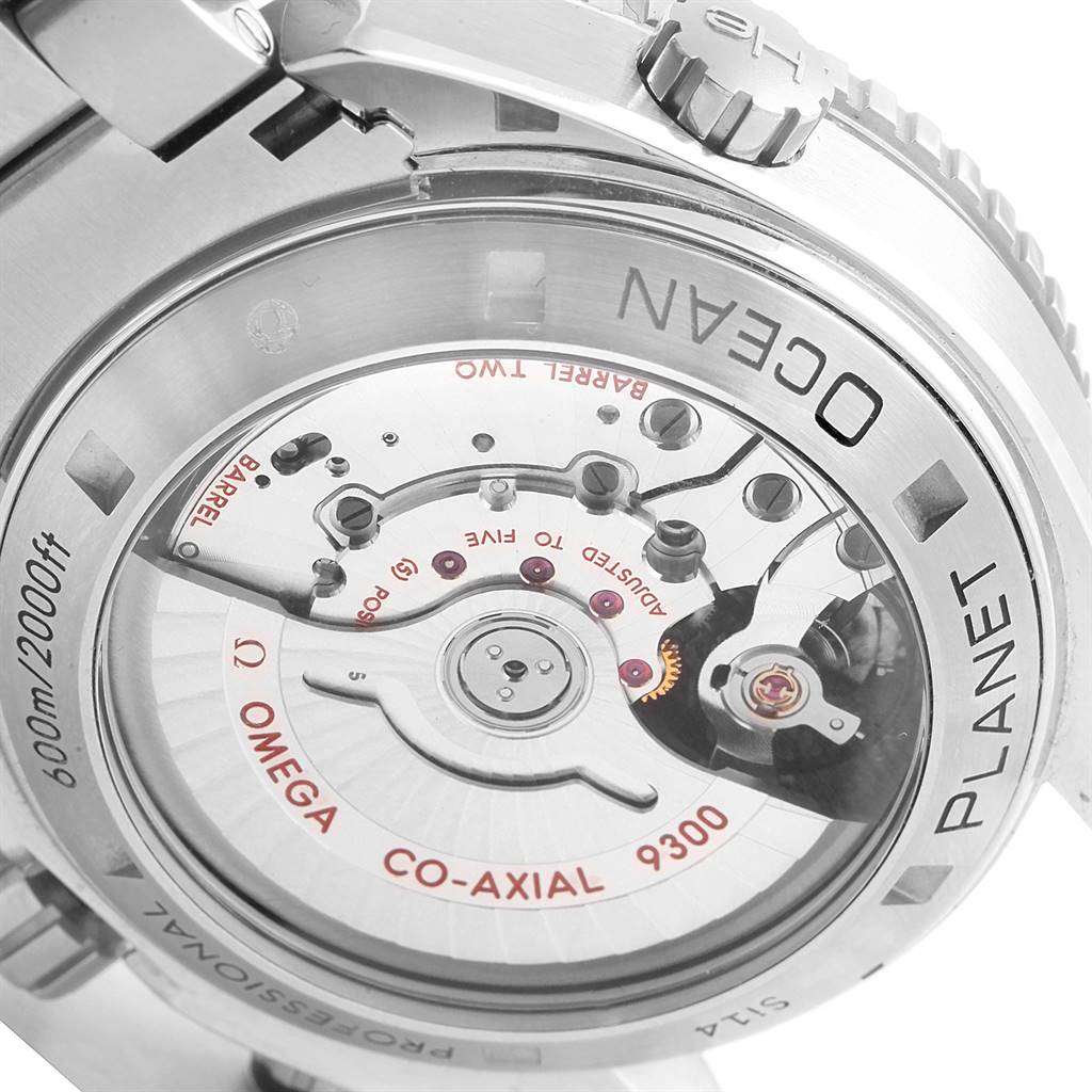 The image shows the case back of an Omega Planet Ocean 232.30.46.51.01.001 Men
s Stainless Steel Black Dial 232.30.46.51.01.001 Men
s Stainless Steel Black Dial watch, revealing the Co-Axial 9300 movement.