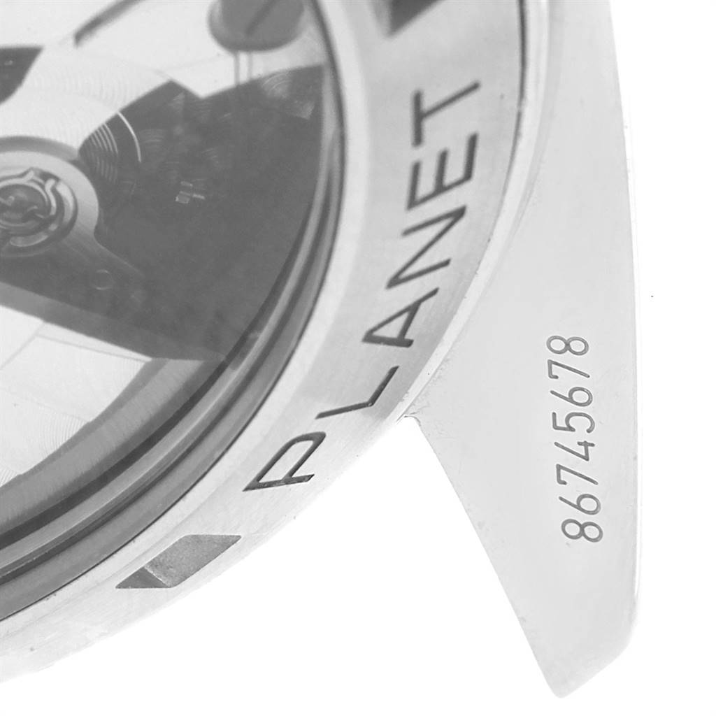 The image shows a close-up of the Omega Planet Ocean 232.30.46.51.01.001 Men
s Stainless Steel Black Dial 232.30.46.51.01.001 Men
s Stainless Steel Black Dial watch
s bezel and partially the lug, revealing part of the serial number.