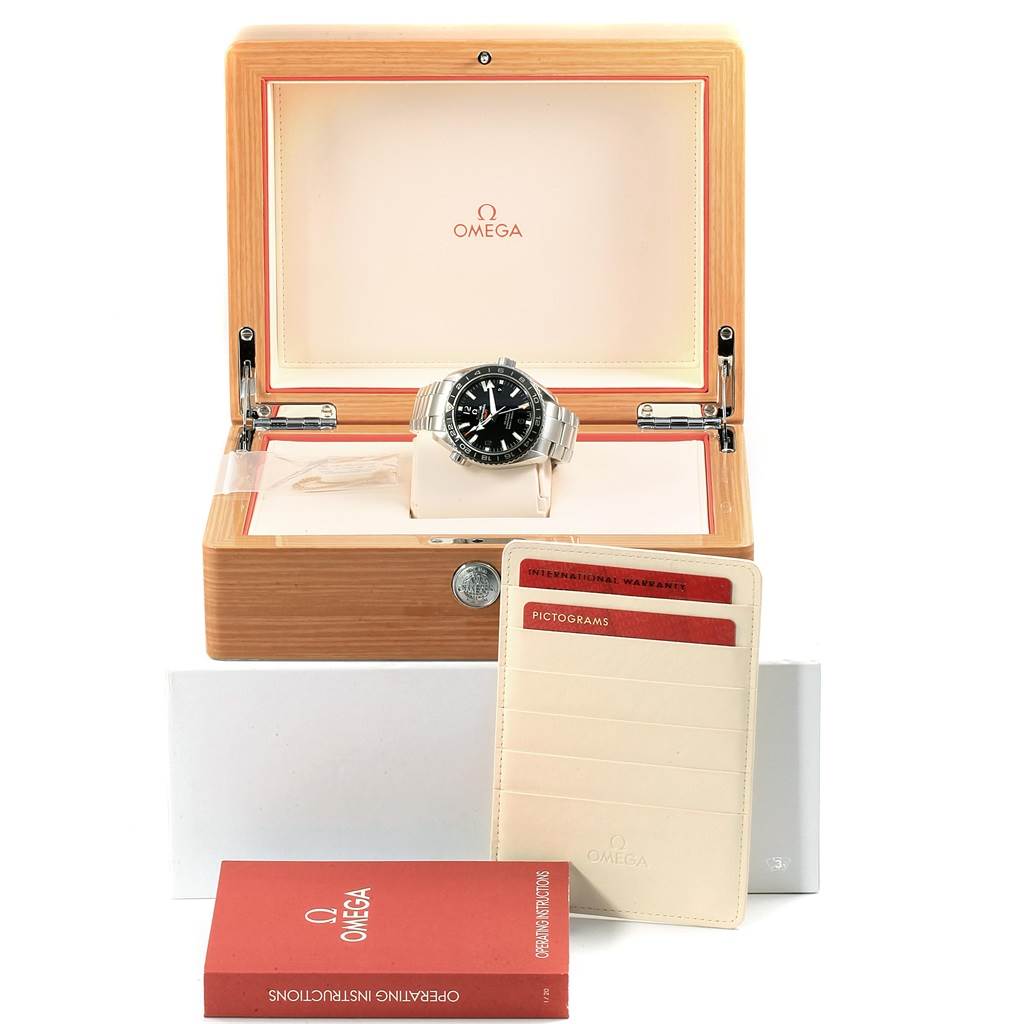 The Omega Planet Ocean 232.30.44.22.01.001 Men
s Stainless Steel Black Dial 232.30.44.22.01.001 Men
s Stainless Steel Black Dial watch is shown head-on with accessories like the box, warranty card, and instruction booklet.