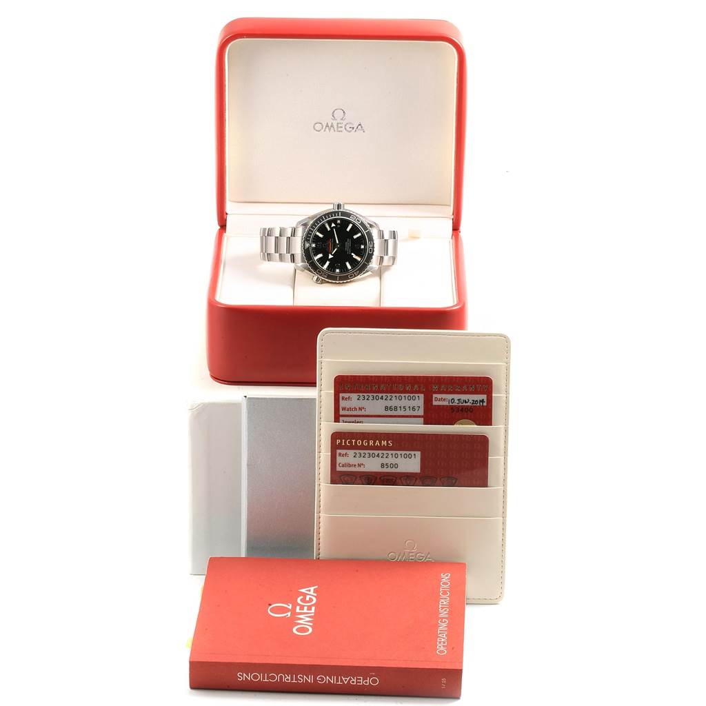 The image shows an Omega Planet Ocean 232.30.42.21.01.001 Men's Stainless Steel Black Dial 232.30.42.21.01.001 Men's Stainless Steel Black Dial watch in its box, with warranty cards, a pictogram card, and an operating instructions booklet.