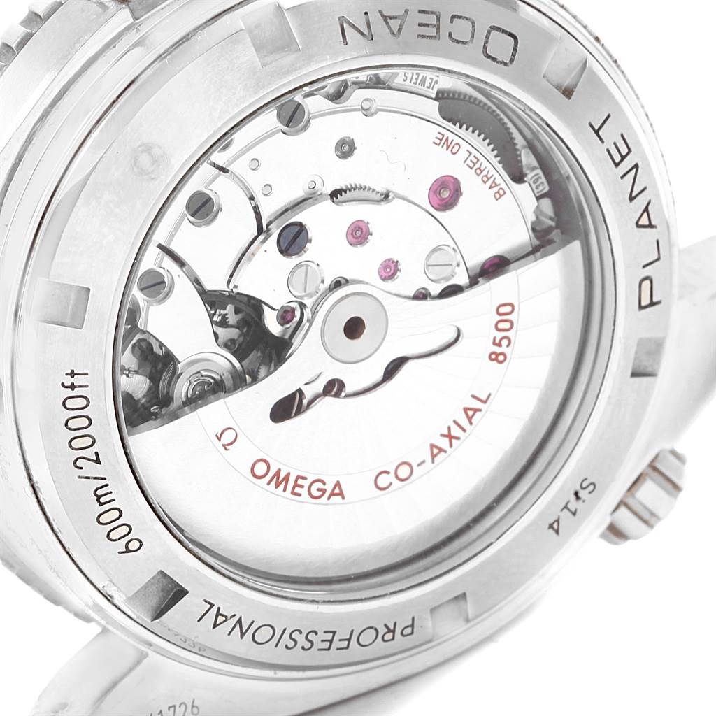 The image shows the back view of an Omega Planet Ocean 232.30.46.21.01.002 Men's Stainless Steel Black Dial 232.30.46.21.01.002 Men's Stainless Steel Black Dial watch, highlighting its Co-Axial 8500 movement.