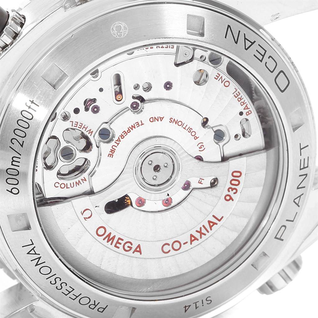 The image shows the open case back of the Omega Planet Ocean 232.30.46.51.01.003 Men's Stainless Steel Black Dial 232.30.46.51.01.003 Men's Stainless Steel Black Dial watch, revealing its Co-Axial 9300 movement.