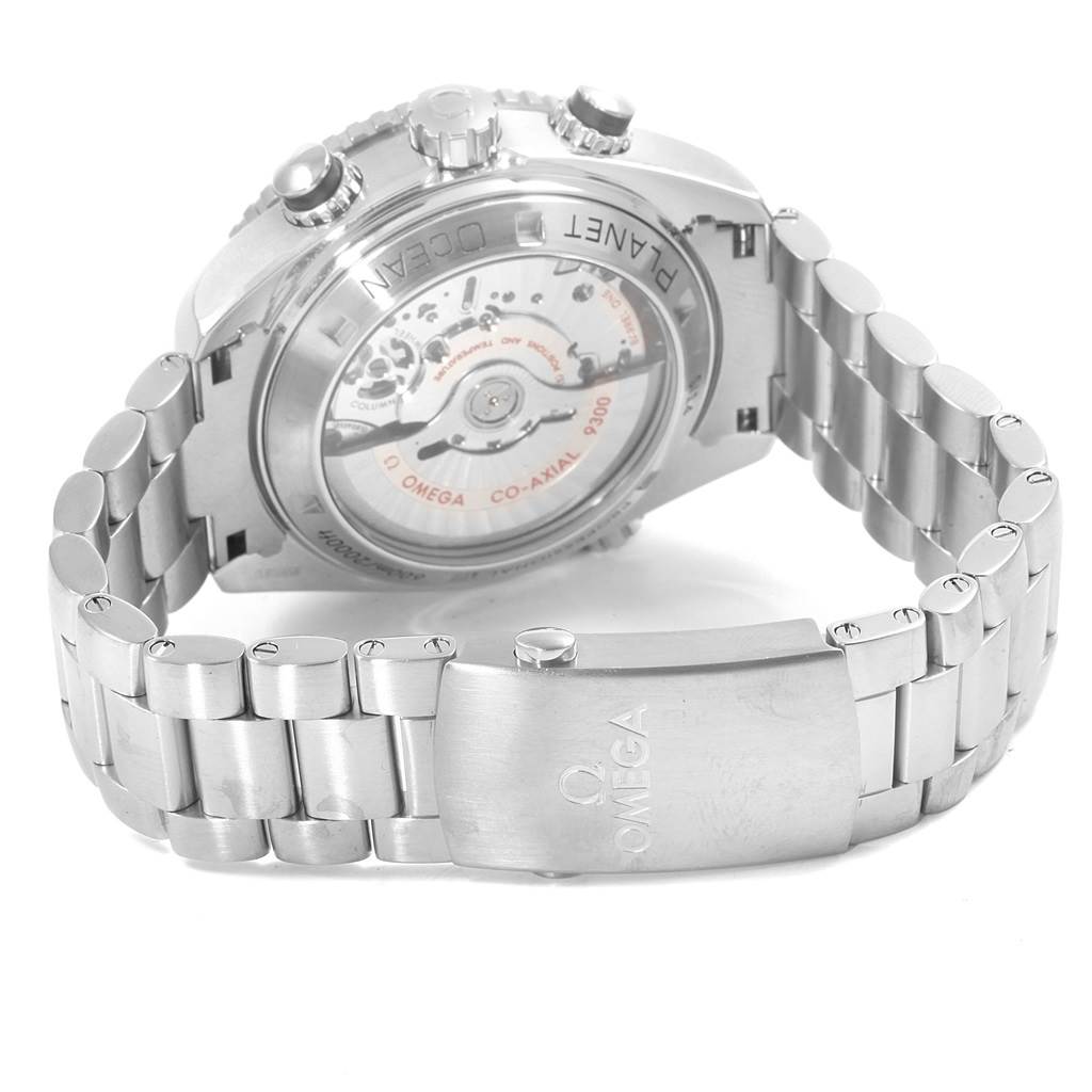 The image shows the back view of the Omega Planet Ocean 232.30.46.51.01.003 Men
s Stainless Steel Black Dial 232.30.46.51.01.003 Men
s Stainless Steel Black Dial watch, highlighting the watch case, clasp, and metal bracelet.