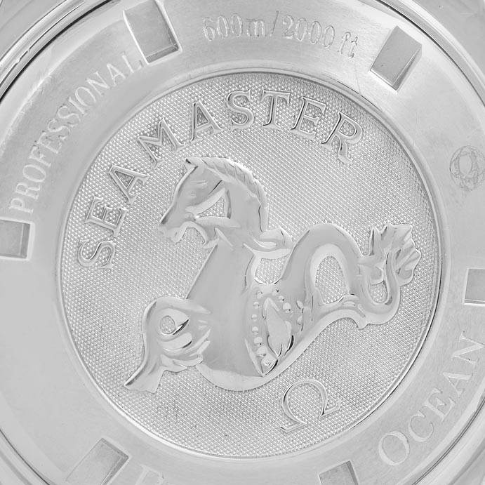 The image shows the caseback of the Omega Seamaster Planet Ocean watch.