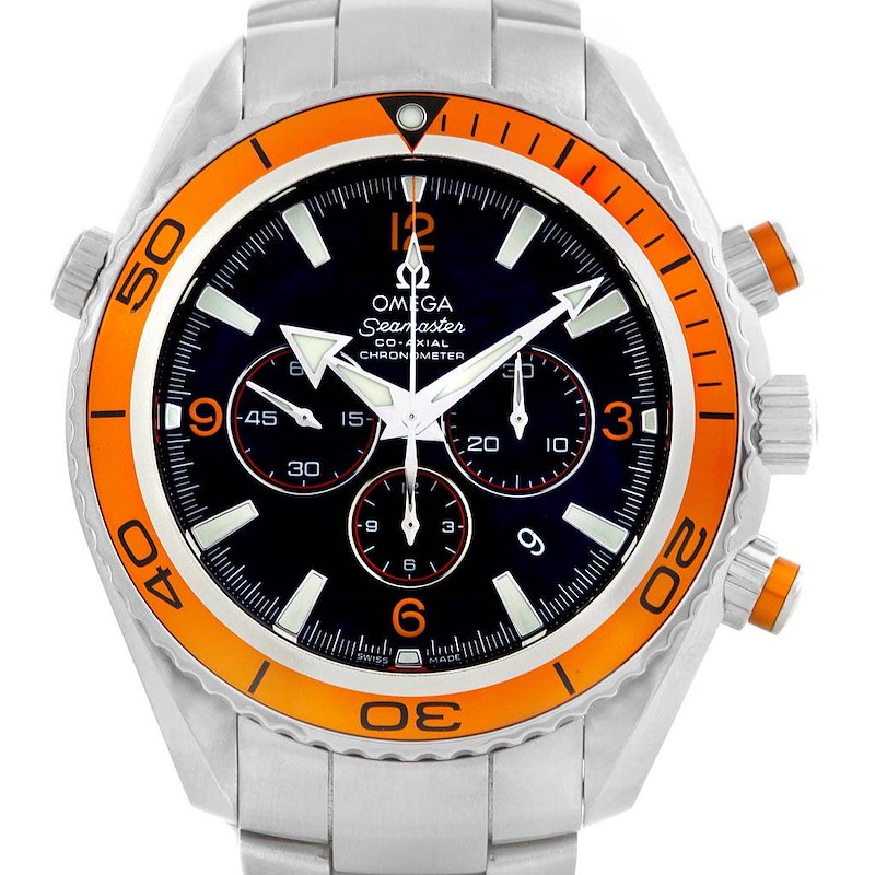 The image shows a front view of the Omega Planet Ocean Seamaster watch with a black dial and an orange bezel.