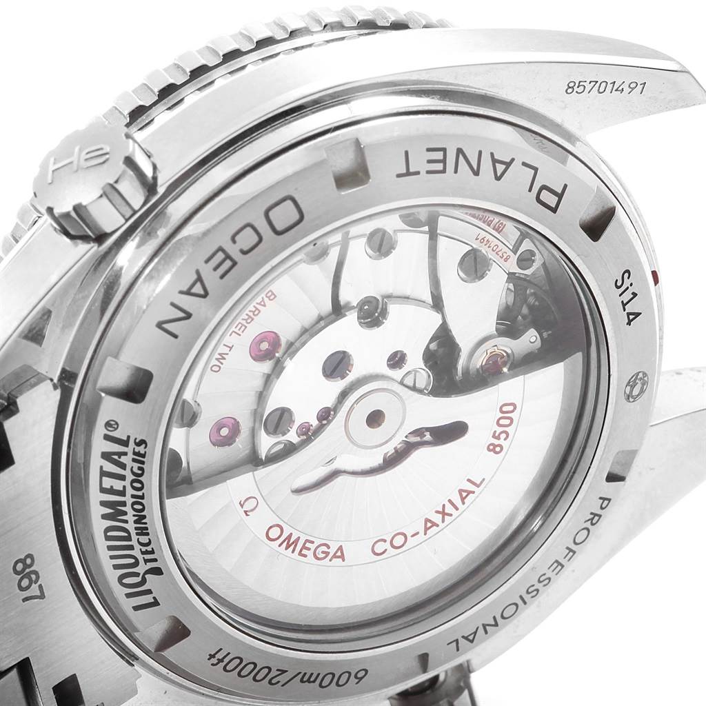 The image shows the back of an Omega Planet Ocean 232.90.46.21.03.001 Men's Titanium Blue Dial 232.90.46.21.03.001 Men's Titanium Blue Dial watch, highlighting the transparent case back and internal movement components.