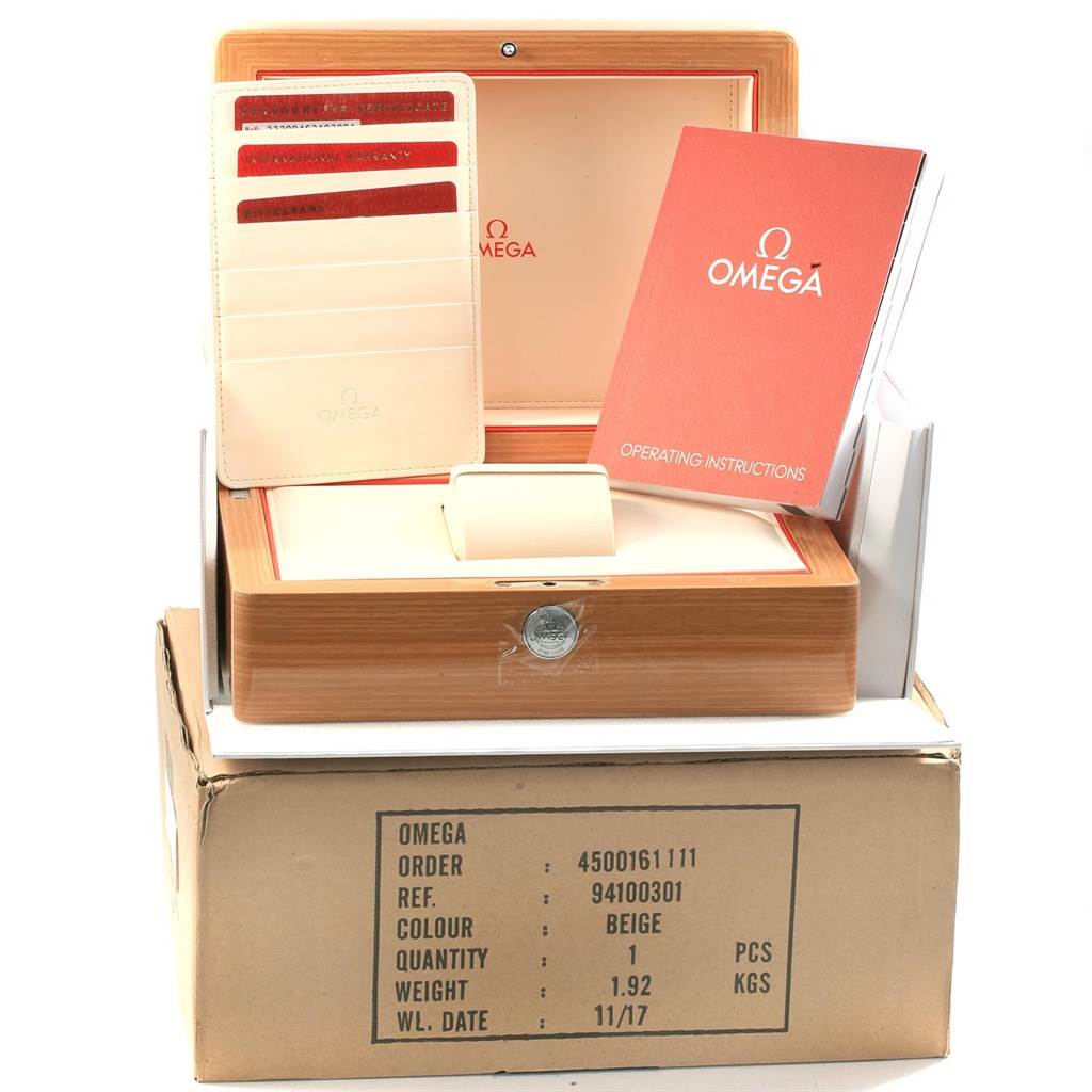 The image shows the Omega Planet Ocean 232.90.46.21.03.001 Men's Titanium Blue Dial 232.90.46.21.03.001 Men's Titanium Blue Dial watch packaging, including an Omega instruction manual, cardholder, and wooden box, viewed from the front angle.