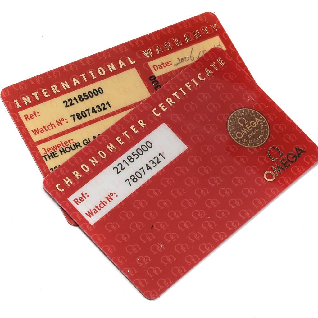 This image shows the International Warranty and Chronometer Certificate cards for the Omega Planet Ocean 2218.50.00 Men
s Stainless Steel Black Dial 2218.50.00 Men
s Stainless Steel Black Dial model.