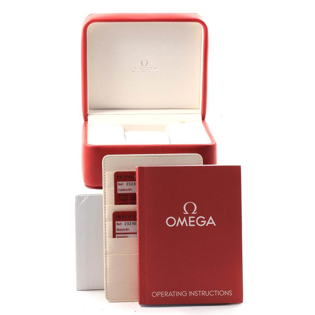 The image shows the packaging, operating instructions, and warranty cards for an Omega Planet Ocean 232.30.46.21.01.001 Men
s Stainless Steel Black Dial 232.30.46.21.01.001 Men
s Stainless Steel Black Dial watch.