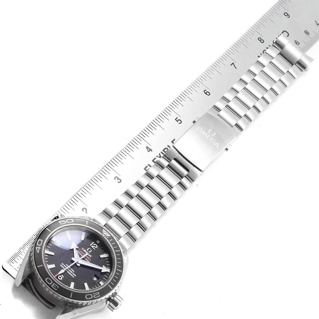 The Omega Planet Ocean 232.30.46.21.01.001 Men
s Stainless Steel Black Dial 232.30.46.21.01.001 Men
s Stainless Steel Black Dial watch is shown from an overhead angle, displaying the face, bezel, and metal bracelet with clasp.