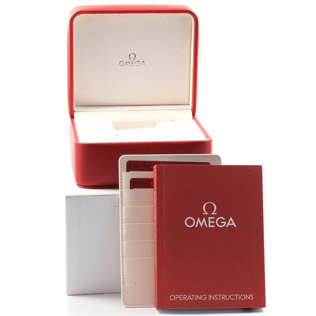 The image shows the Omega Planet Ocean 232.30.46.21.01.001 Men
s Stainless Steel Black Dial 232.30.46.21.01.001 Men
s Stainless Steel Black Dial watch box, operating instructions, and warranty cards from a front angle.