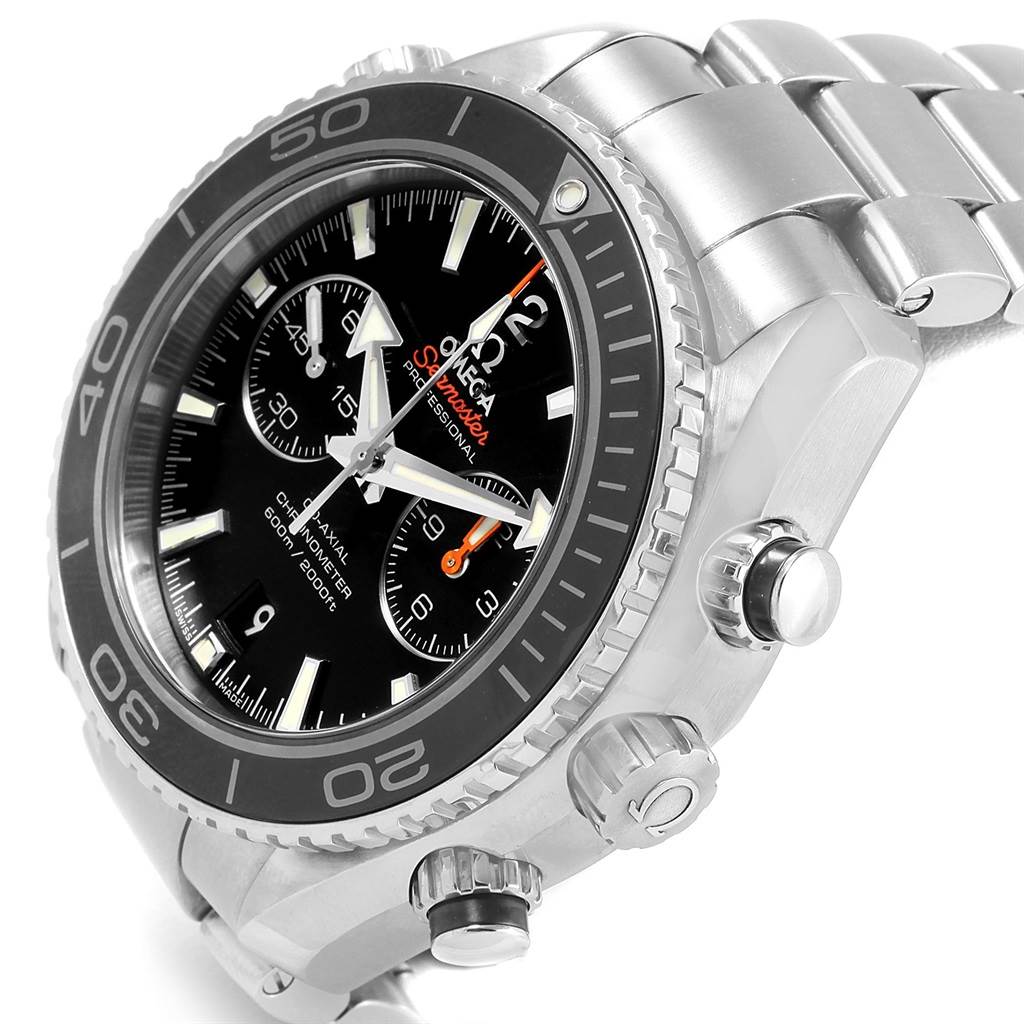 The image shows a close-up side angle of the Omega Planet Ocean 232.30.46.51.01.003 Men
s Stainless Steel Black Dial 232.30.46.51.01.003 Men
s Stainless Steel Black Dial watch, highlighting its bezel, dial, and crown.