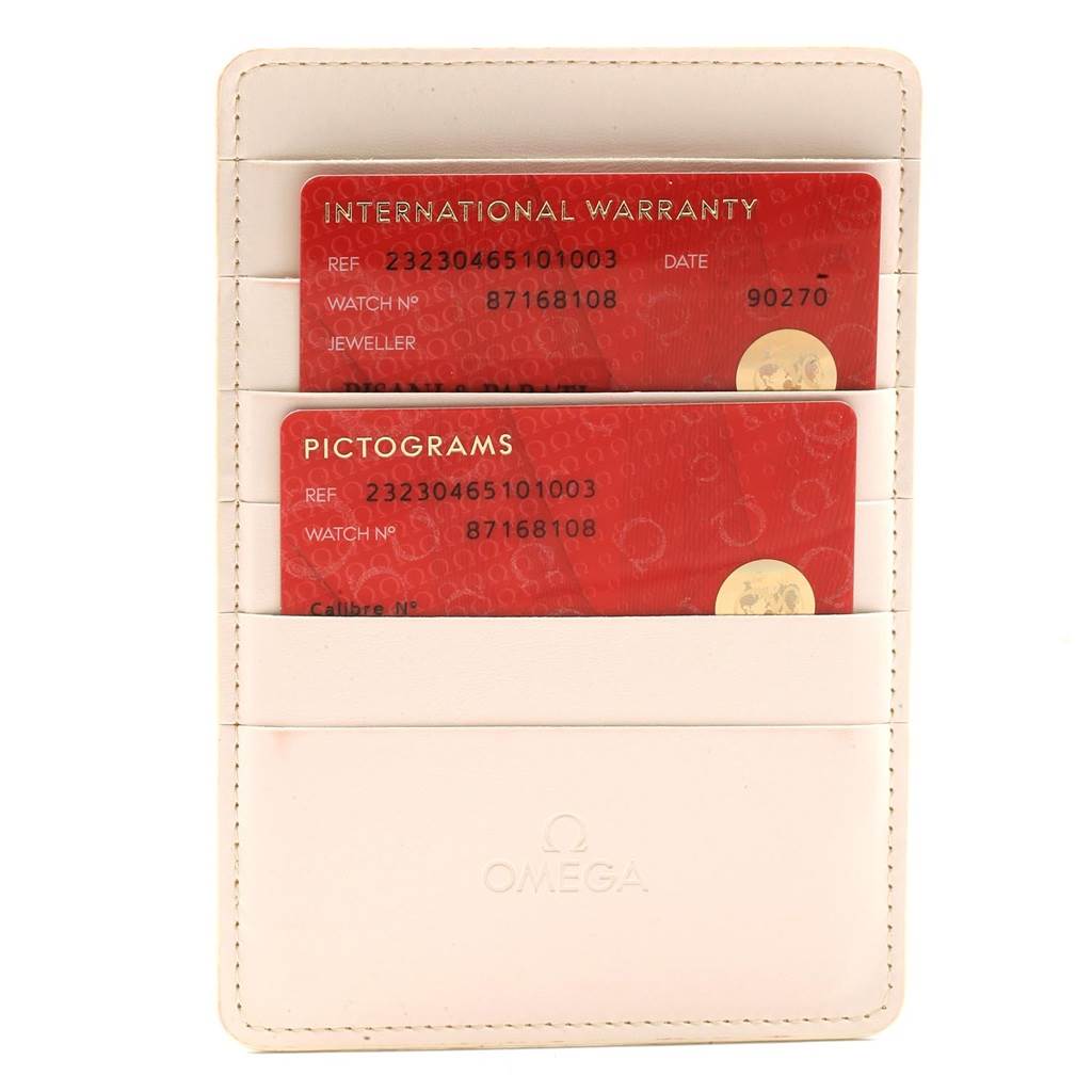 The image shows an Omega Planet Ocean 232.30.46.51.01.003 Men
s Stainless Steel Black Dial 232.30.46.51.01.003 Men
s Stainless Steel Black Dial model
s International Warranty and Pictograms cards in a white cardholder.