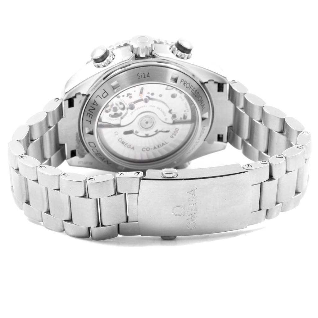 The image shows the back view of the Omega Planet Ocean 232.30.46.51.01.003 Men
s Stainless Steel Black Dial 232.30.46.51.01.003 Men
s Stainless Steel Black Dial watch, including its exhibition case back and stainless steel bracelet.