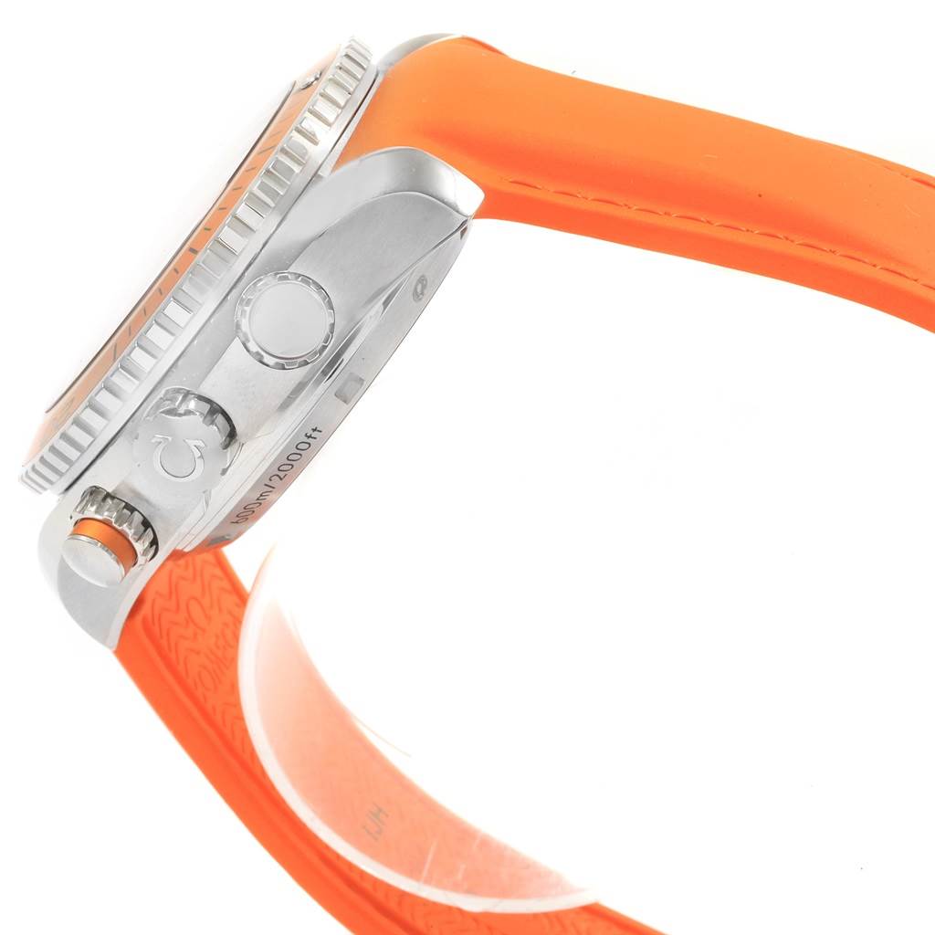 A side view of the Omega Planet Ocean 232.32.46.51.01.001 Men
s Stainless Steel Black Dial 232.32.46.51.01.001 Men
s Stainless Steel Black Dial watch, showcasing the crown, bezel, and orange strap.