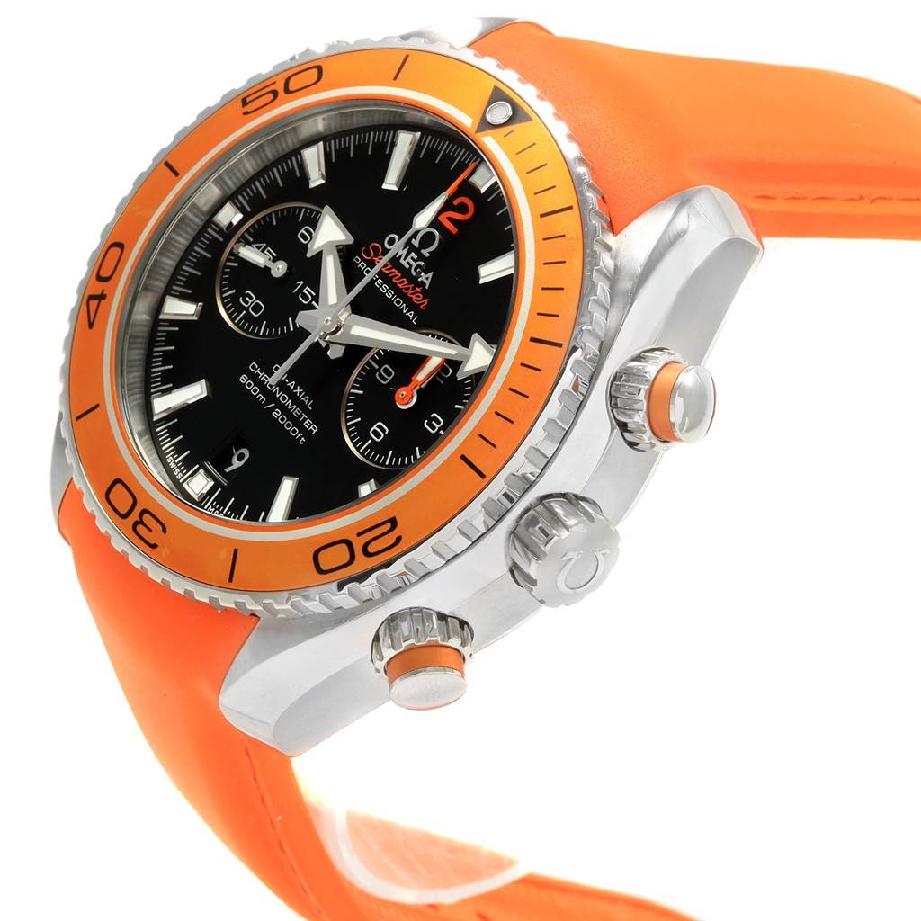 The image shows a side angle of the Omega Planet Ocean 232.32.46.51.01.001 Men
s Stainless Steel Black Dial 232.32.46.51.01.001 Men
s Stainless Steel Black Dial watch, highlighting its orange bezel, dial, and crown details.