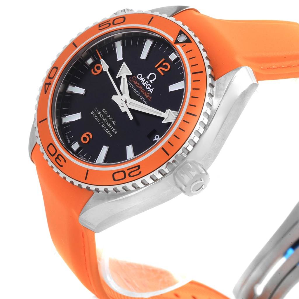 The image shows an angled close-up of the Omega Planet Ocean 232.32.42.21.01.001 Men
s Stainless Steel Black Dial 232.32.42.21.01.001 Men
s Stainless Steel Black Dial watch with an orange bezel and strap.