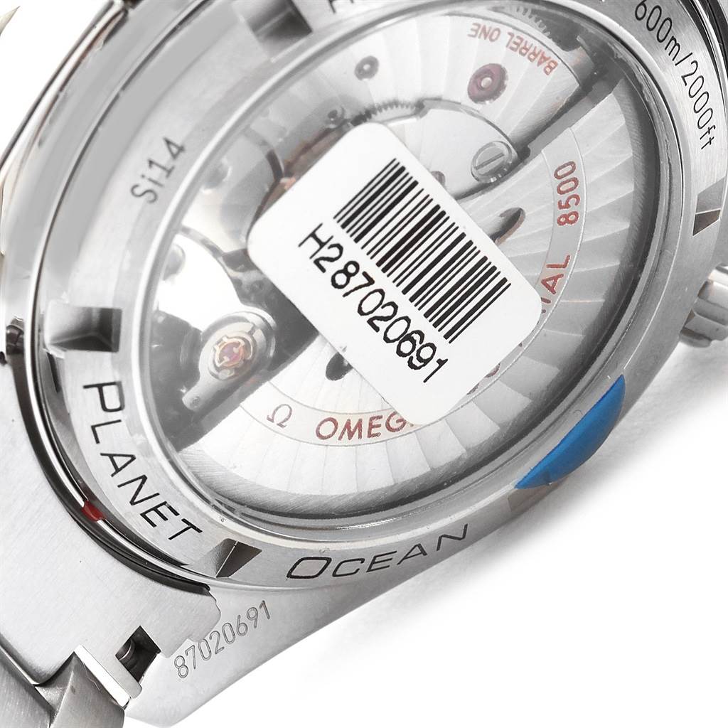 The image shows the back view of an Omega Planet Ocean 232.30.42.21.01.002 Men
s Stainless Steel Black Dial 232.30.42.21.01.002 Men
s Stainless Steel Black Dial watch, highlighting the caseback and internal mechanisms.