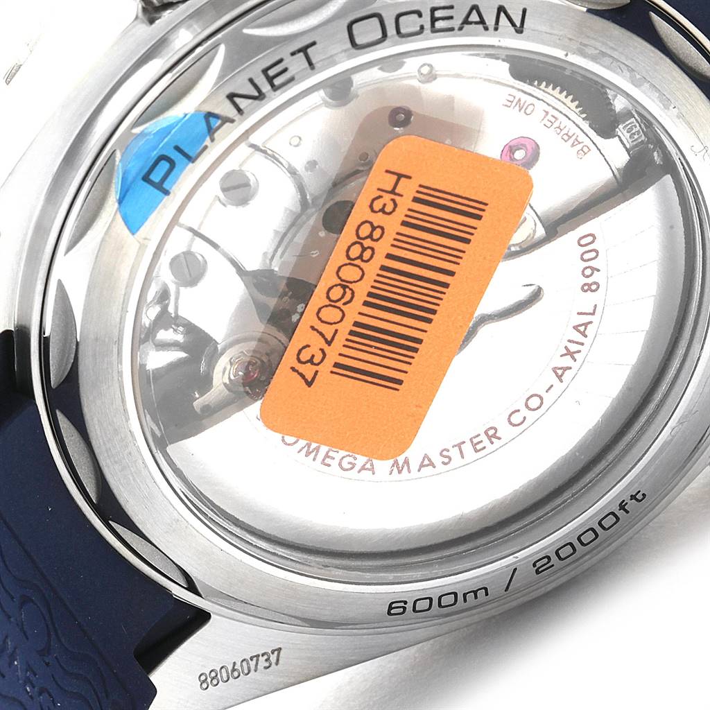 This image shows the clear case back of an Omega Planet Ocean 215.33.44.21.03.001 Men
s Stainless Steel Blue Dial 215.33.44.21.03.001 Men
s Stainless Steel Blue Dial watch, revealing its internal mechanical parts.