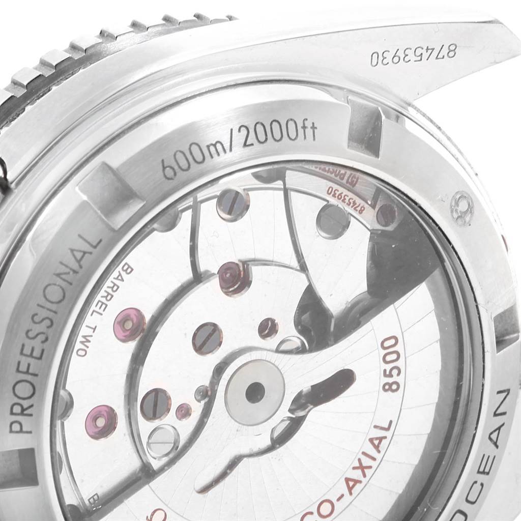 This is a close-up of the Omega Planet Ocean 232.30.42.21.01.001 Men
s Stainless Steel Black Dial 232.30.42.21.01.001 Men
s Stainless Steel Black Dial watch, showing its back case and exposed movement components.