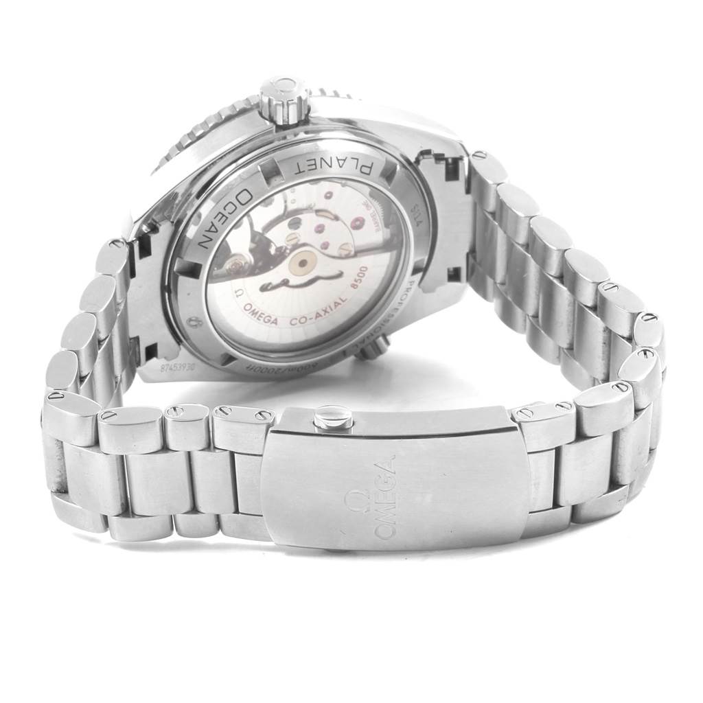 The image shows the back view of the Omega Planet Ocean 232.30.42.21.01.001 Men
s Stainless Steel Black Dial 232.30.42.21.01.001 Men
s Stainless Steel Black Dial watch, highlighting its movement and stainless steel bracelet.