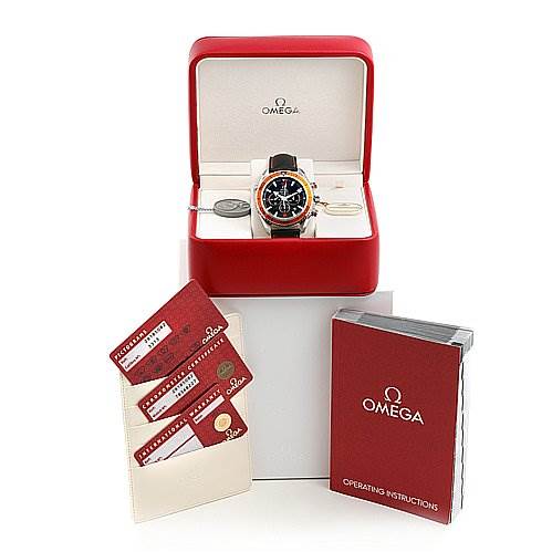 The image shows an Omega Planet Ocean 29185082 OR 2918.   50.   82 Men's Stainless Steel Black Dial 29185082 OR 2918.   50.   82 Men's Stainless Steel Black Dial watch in its box, accompanied by warranty cards and an operating instructions booklet.
