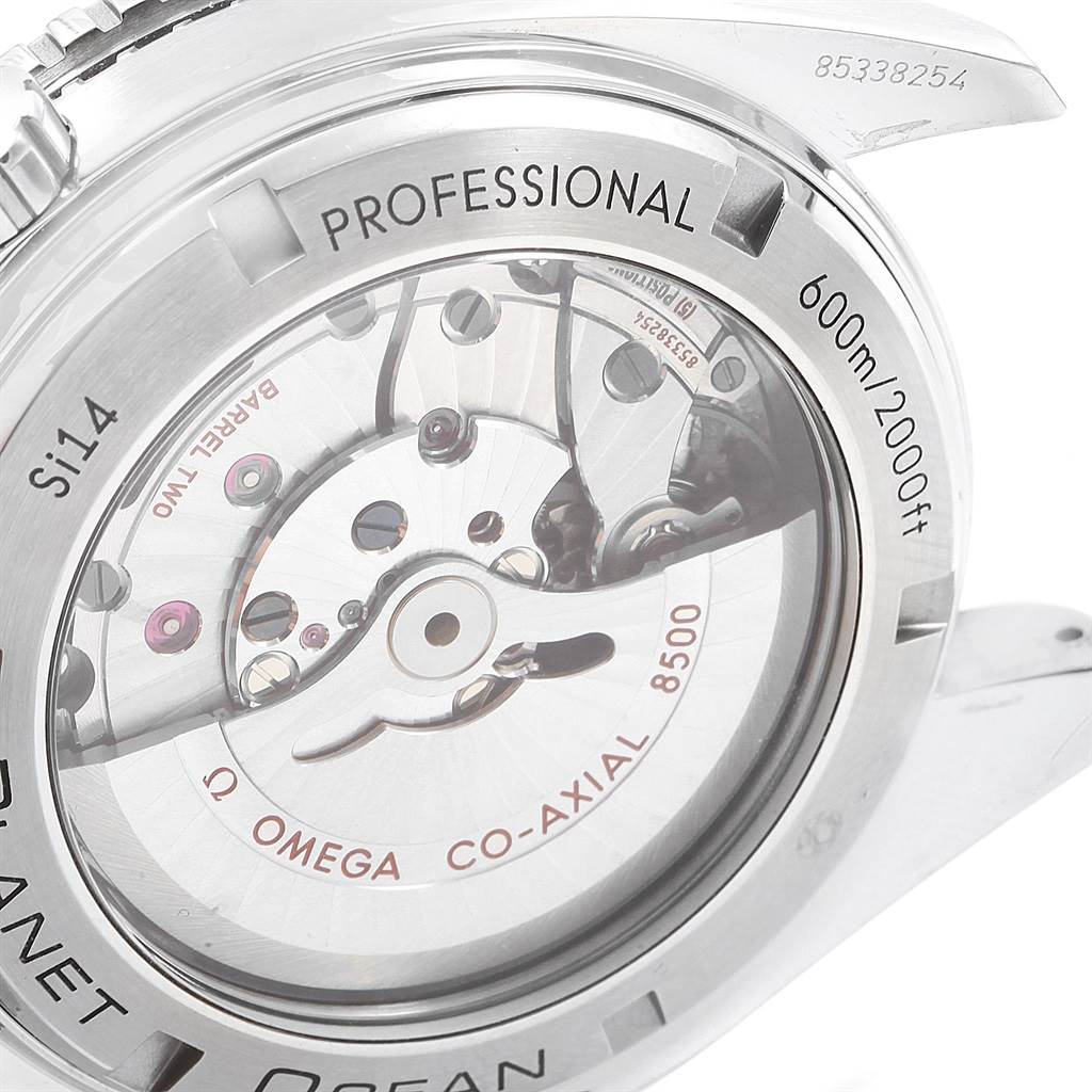 This image shows the back case and internal mechanism of the Omega Planet Ocean 232.30.46.21.01.001 Men
s Stainless Steel Black Dial 232.30.46.21.01.001 Men
s Stainless Steel Black Dial watch from an angled top-down view.