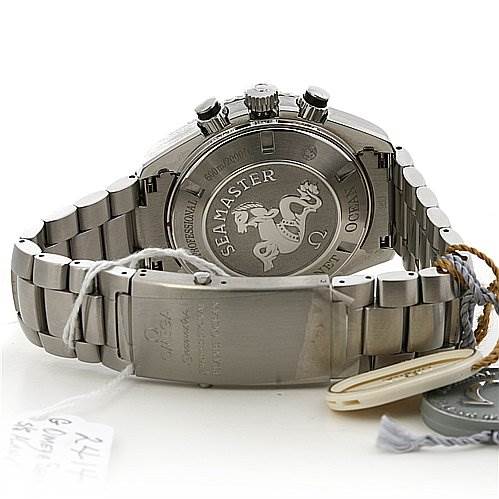 The photo shows the back case, clasp, and bracelet of the Omega Seamaster Planet Ocean watch.
