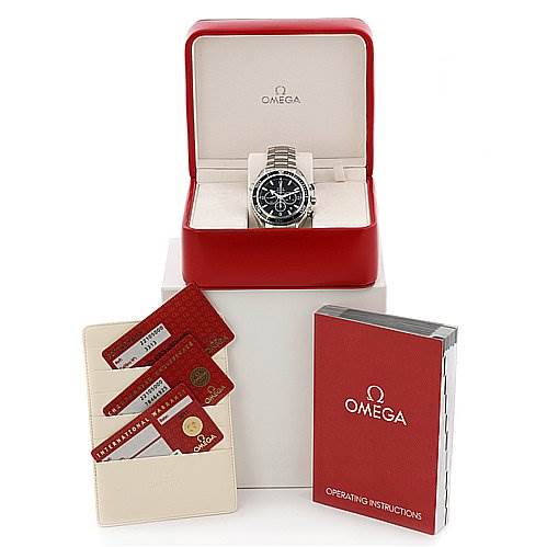 The image shows an Omega Planet Ocean 22105000 OR 2210.   50.   00 Men's Stainless Steel Black Dial 22105000 OR 2210.   50.   00 Men's Stainless Steel Black Dial watch in its open red case, with accompanying instruction manual and warranty cards displayed.