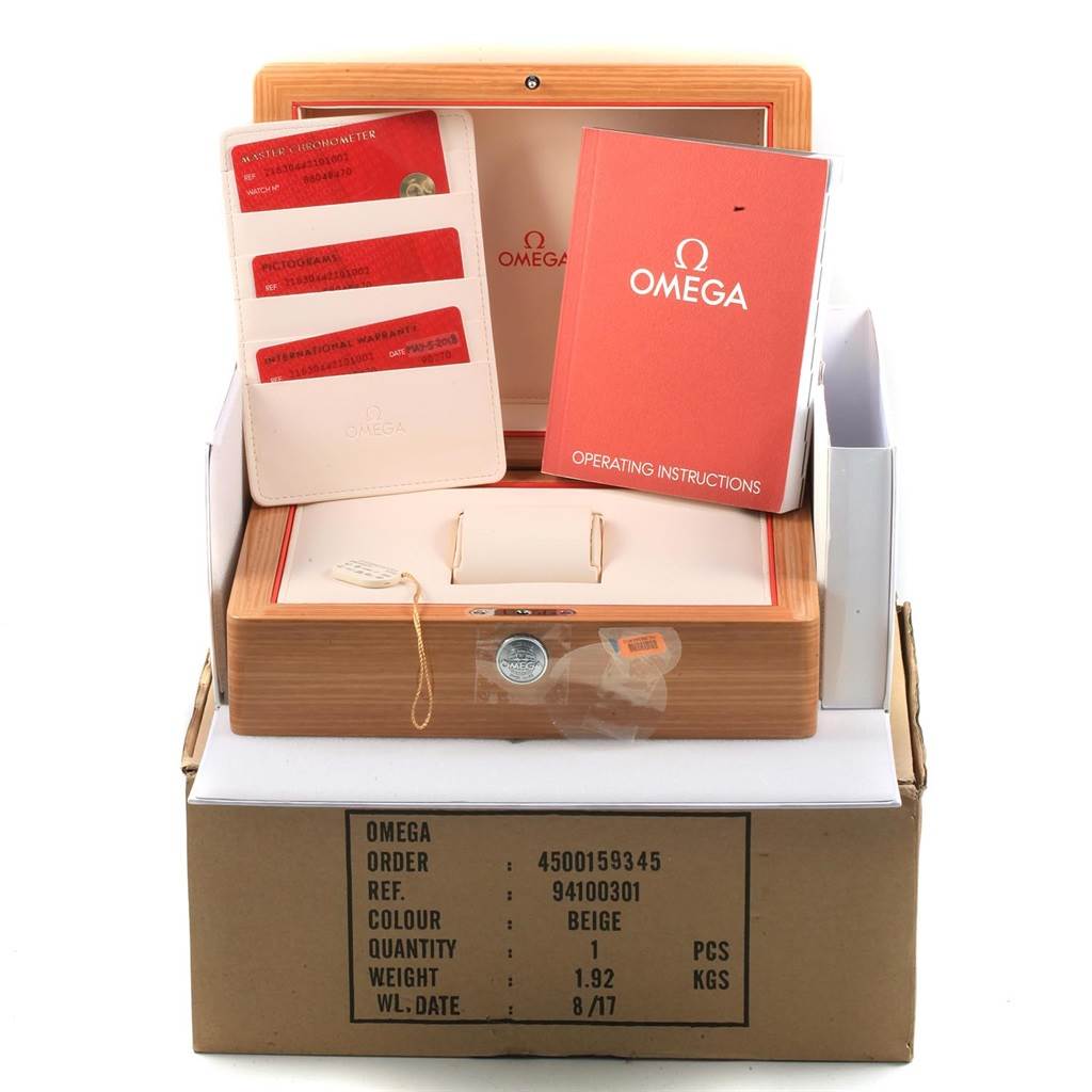 The image shows the box, operating instructions, and paperwork for the Omega Planet Ocean 215.30.44.21.01.002 Men
s Stainless Steel Black Dial 215.30.44.21.01.002 Men
s Stainless Steel Black Dial watch.