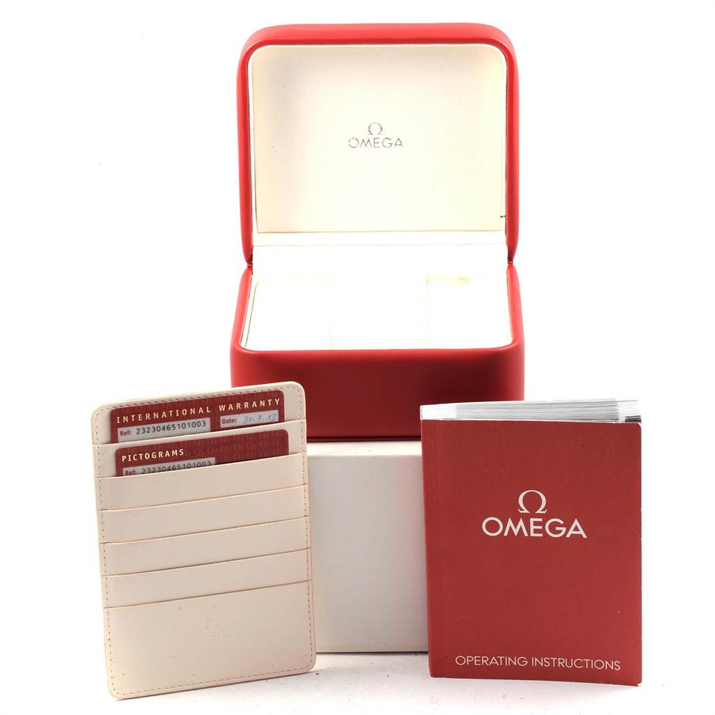 The image shows an Omega Planet Ocean 232.30.42.21.01.003 Men
s Stainless Steel Black Dial 232.30.42.21.01.003 Men
s Stainless Steel Black Dial watch box, international warranty cards, and an operating instructions booklet.