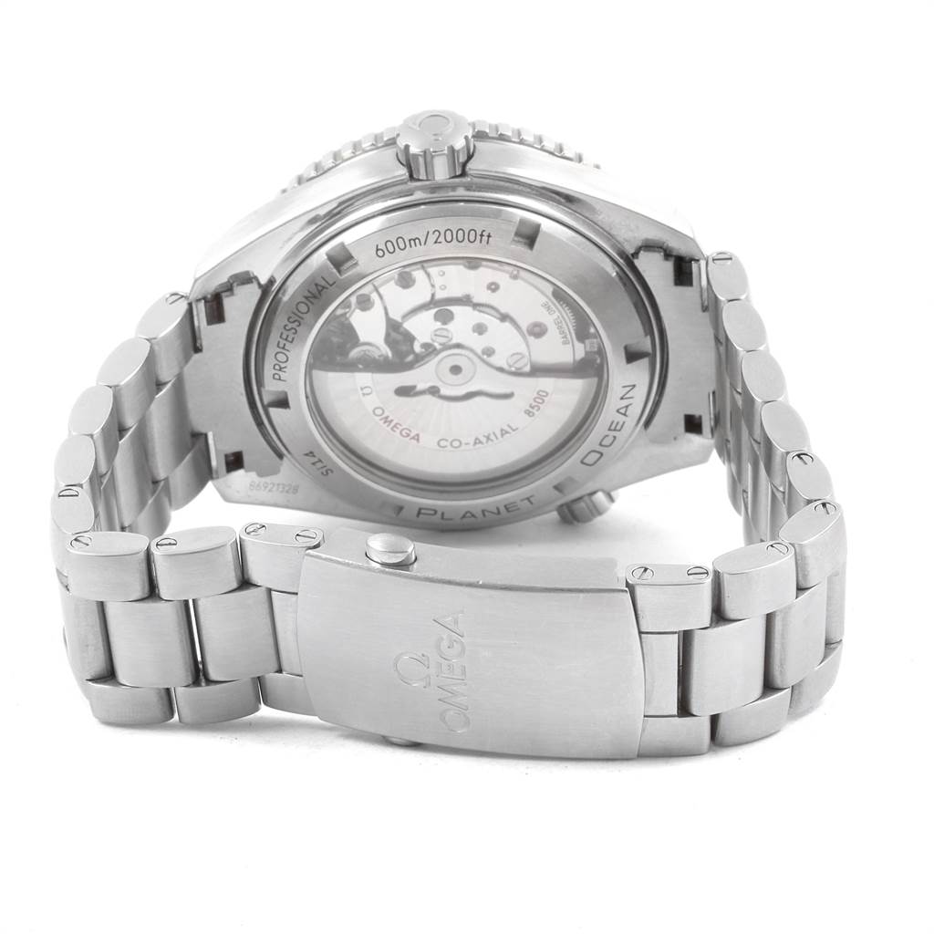 The image shows the back view of the Omega Planet Ocean 232.30.46.21.01.001 Men
s Stainless Steel Black Dial 232.30.46.21.01.001 Men
s Stainless Steel Black Dial watch, highlighting the exhibition case back and metal bracelet.