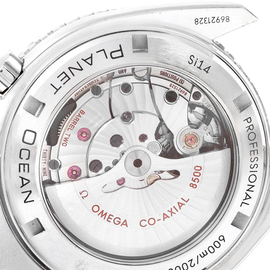 The image shows the back view of an Omega Planet Ocean 232.30.46.21.01.001 Men
s Stainless Steel Black Dial 232.30.46.21.01.001 Men
s Stainless Steel Black Dial watch, highlighting its 8500 Co-Axial movement.