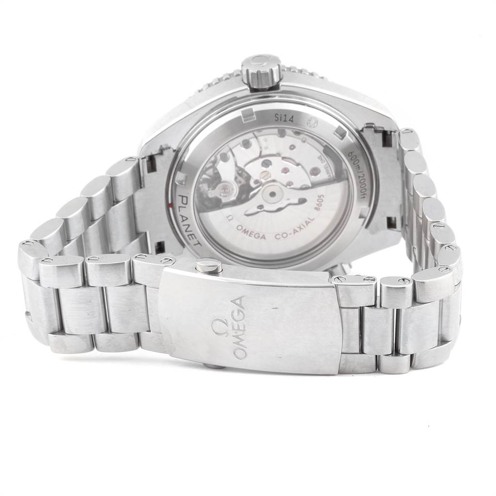 The image shows the back view and bracelet of an Omega Planet Ocean 232.30.44.22.01.001 Men
s Stainless Steel Black Dial 232.30.44.22.01.001 Men
s Stainless Steel Black Dial watch, highlighting the transparent case back and movement.