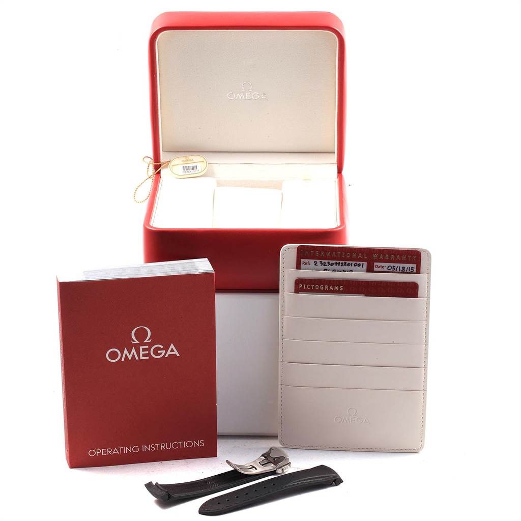 The image shows the Omega Planet Ocean 232.30.44.22.01.001 Men
s Stainless Steel Black Dial 232.30.44.22.01.001 Men
s Stainless Steel Black Dial
s box, instructions, warranty card holder, and extra black strap with clasp.