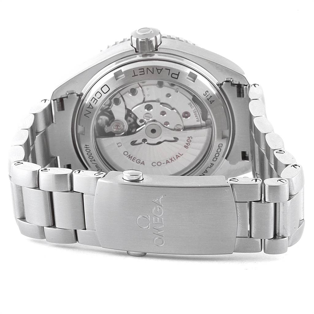 The image shows the back view of the Omega Planet Ocean 232.30.44.22.03.001 Men's Stainless Steel Blue Dial 232.30.44.22.03.001 Men's Stainless Steel Blue Dial watch, highlighting its open case back and bracelet.