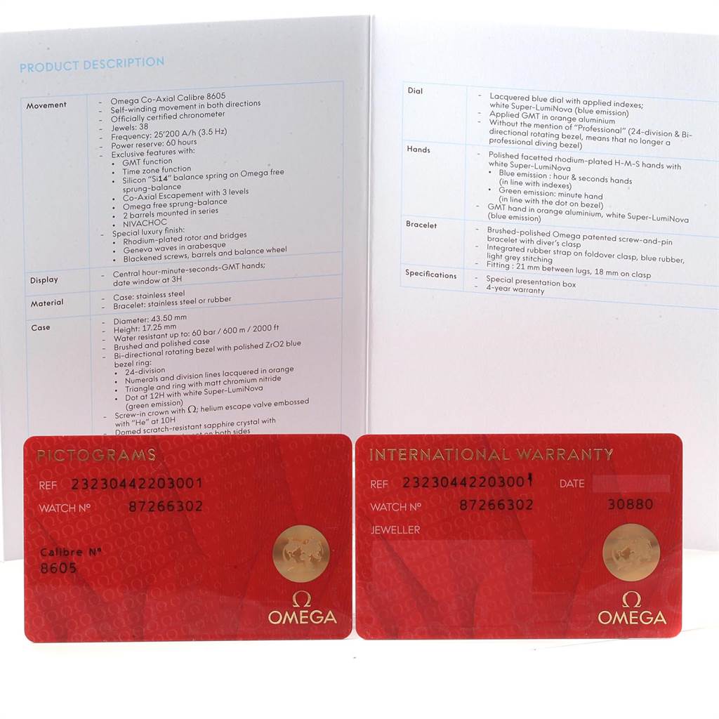 The image shows warranty cards and the product description for the Omega Planet Ocean 232.30.44.22.03.001 Men's Stainless Steel Blue Dial 232.30.44.22.03.001 Men's Stainless Steel Blue Dial watch.