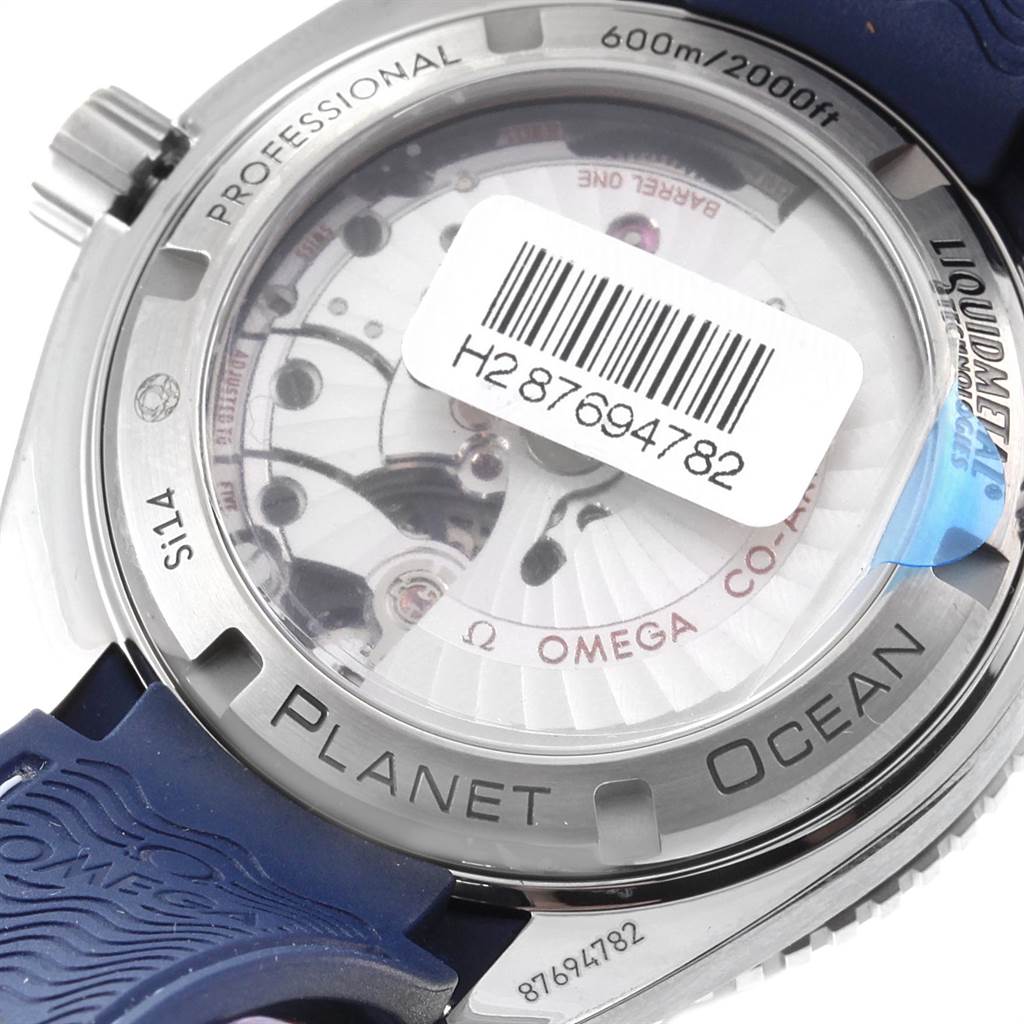 The image shows the back of the Omega Planet Ocean 232.92.42.21.03.001 Men's Titanium Blue Dial 232.92.42.21.03.001 Men's Titanium Blue Dial watch, highlighting its transparent case back and inner movement components.