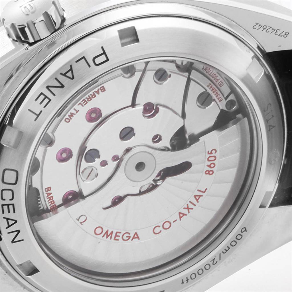 This image shows the back view of an Omega Planet Ocean 232.30.44.22.01.001 Men
s Stainless Steel Black Dial 232.30.44.22.01.001 Men
s Stainless Steel Black Dial watch, highlighting its Co-Axial movement and serial number.