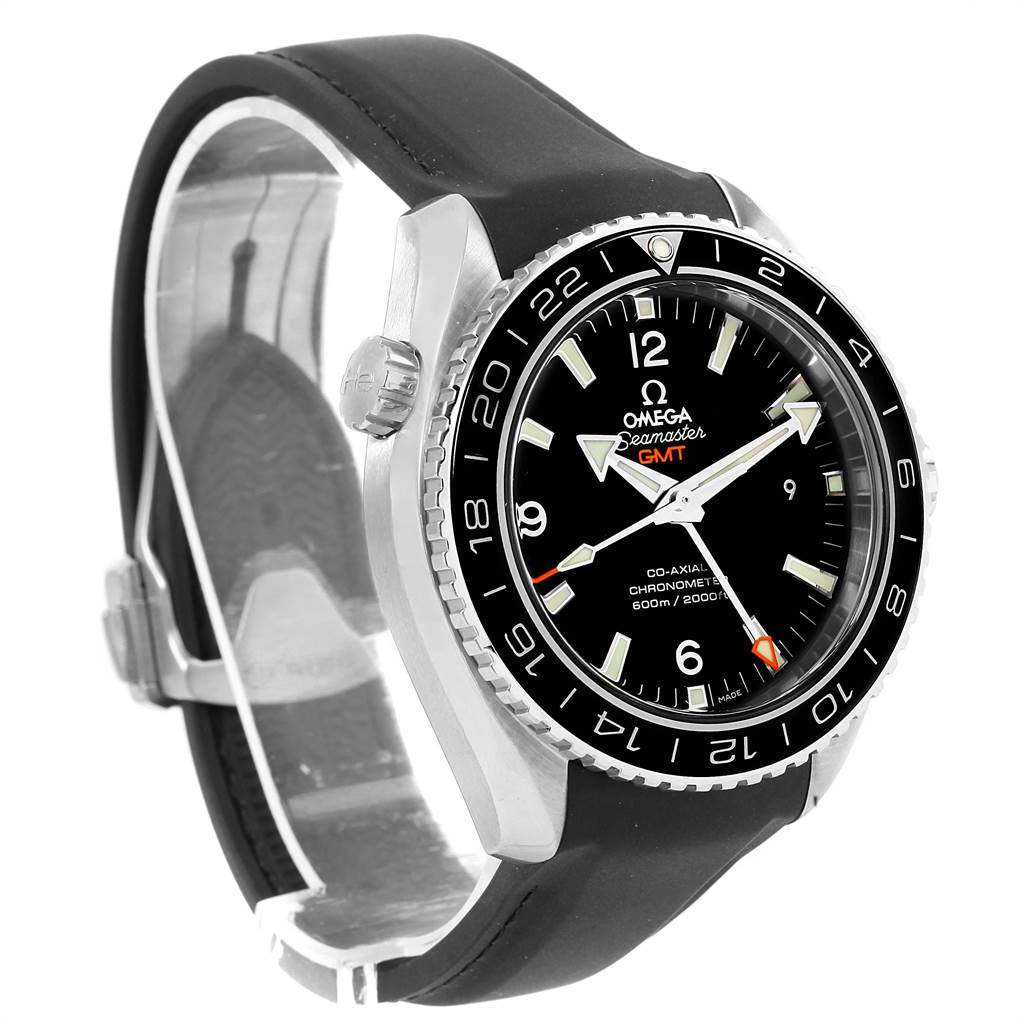 The image shows an Omega Seamaster Planet Ocean GMT watch from an angled view, displaying its face, bezel, and strap.