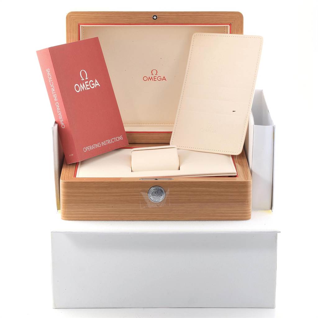 The image shows the packaging, instruction manual, and cardholder for the Omega Planet Ocean 222.18.42.20.01.001 Men
s Stainless Steel Black Dial 222.18.42.20.01.001 Men
s Stainless Steel Black Dial watch.