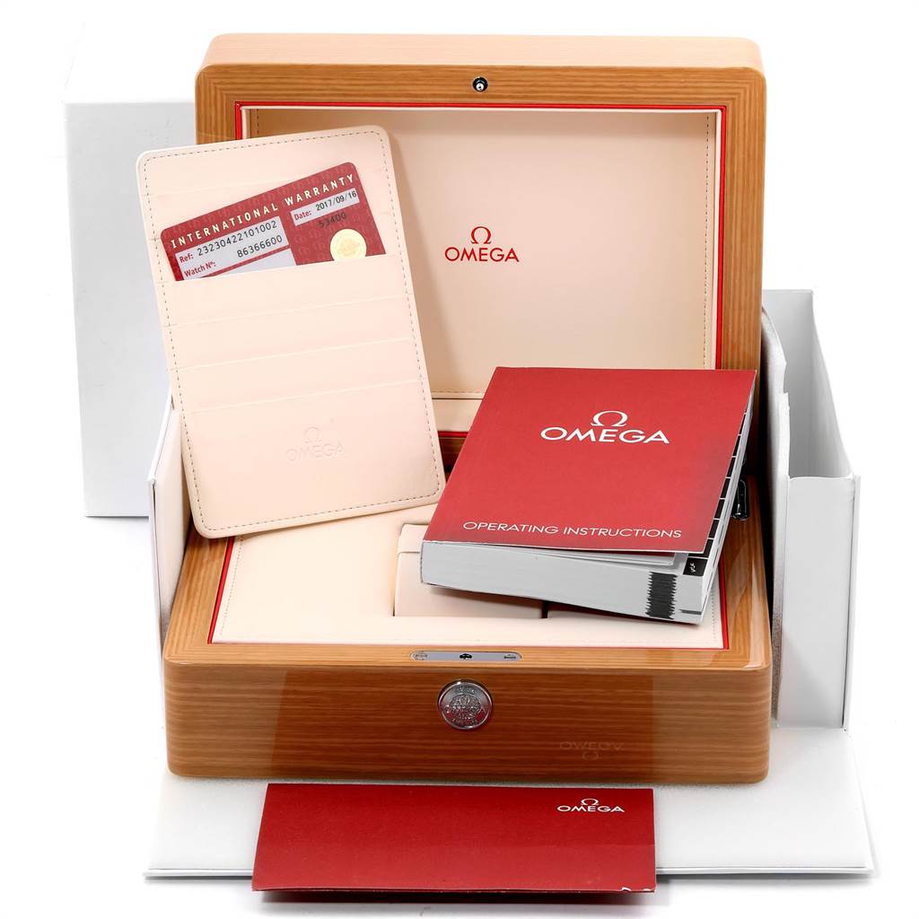 This image shows the storage box, warranty card, and operating instructions for the Omega Planet Ocean 232.30.42.21.01.002 Men
s Stainless Steel Black Dial 232.30.42.21.01.002 Men
s Stainless Steel Black Dial model.