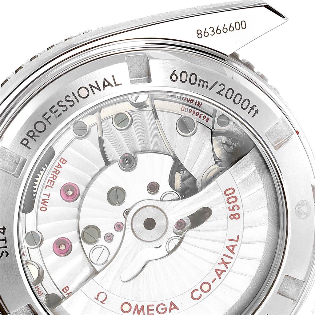 The image shows the back casing of an Omega Planet Ocean 232.30.42.21.01.002 Men
s Stainless Steel Black Dial 232.30.42.21.01.002 Men
s Stainless Steel Black Dial watch, highlighting the movement mechanisms and inscriptions.