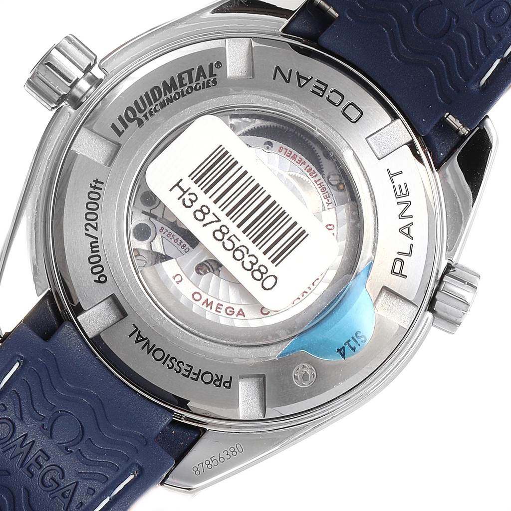 The image shows the back case of the Omega Planet Ocean 232.92.38.20.03.001 Titanium Blue Dial 232.92.38.20.03.001 Titanium Blue Dial watch, highlighting the inner mechanisms and brand engravings.