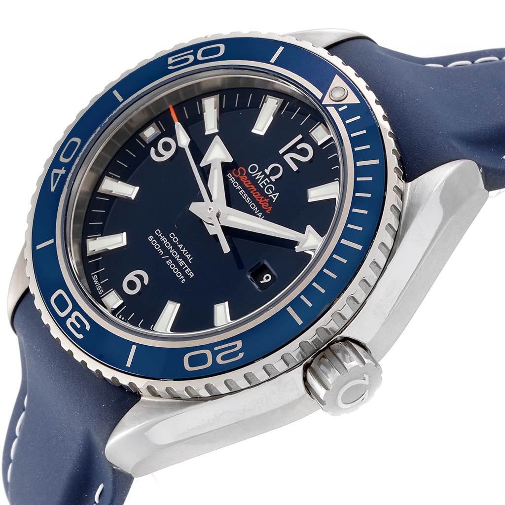 The image shows an angled view of an Omega Planet Ocean 232.92.38.20.03.001 Titanium Blue Dial 232.92.38.20.03.001 Titanium Blue Dial watch, highlighting the bezel, crown, and part of the strap.