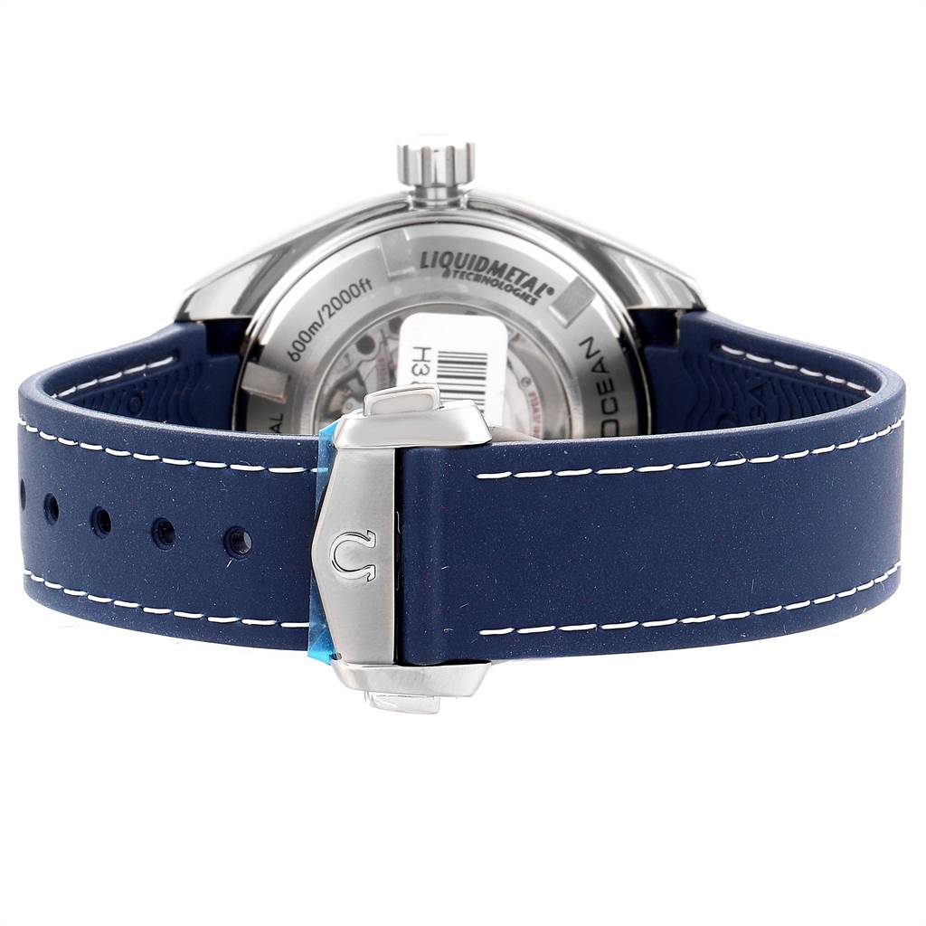 The image shows the back of the Omega Planet Ocean 232.92.38.20.03.001 Titanium Blue Dial 232.92.38.20.03.001 Titanium Blue Dial watch with a focus on the clasp and blue strap.