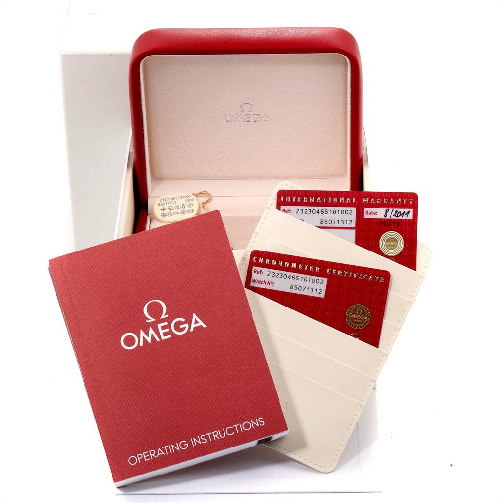 The image shows the packaging, warranty cards, and operating instructions for an Omega Planet Ocean 232.30.46.51.01.002 Men
s Stainless Steel Black Dial 232.30.46.51.01.002 Men
s Stainless Steel Black Dial watch.